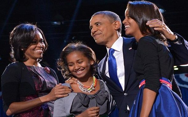Obama tears up during tribute to Michelle, daughters
